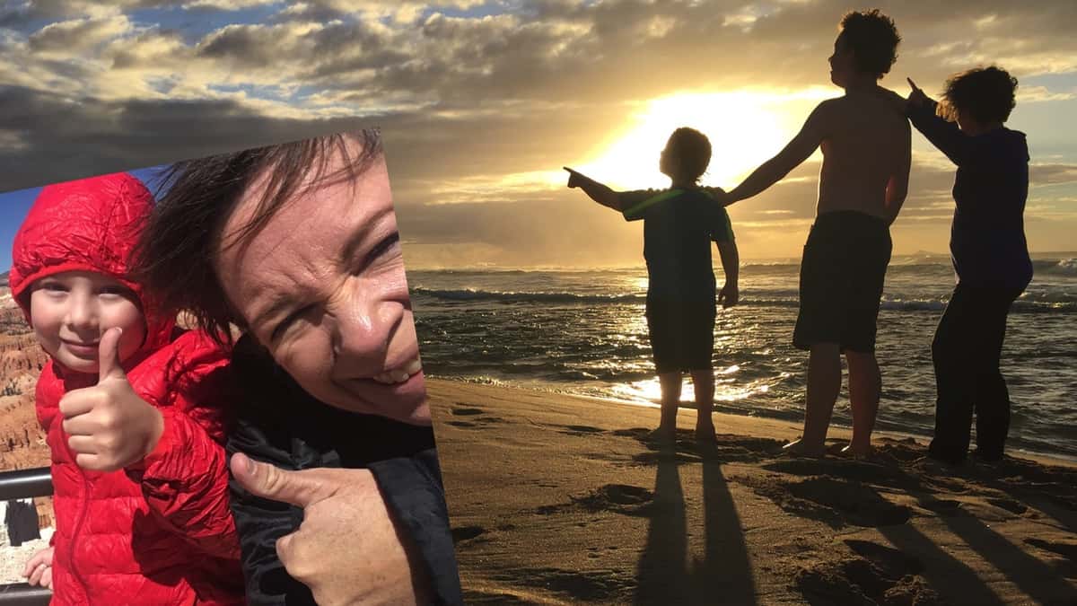Amanda and sons on a Kauai beach at sunset