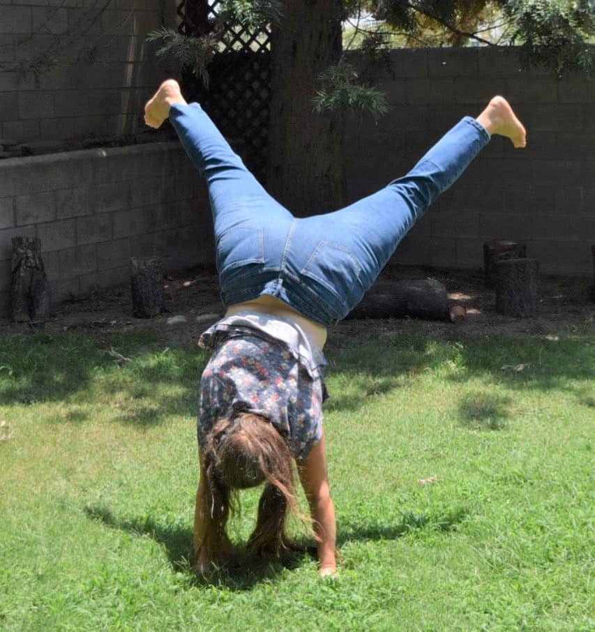 Tisha, doing a handstand