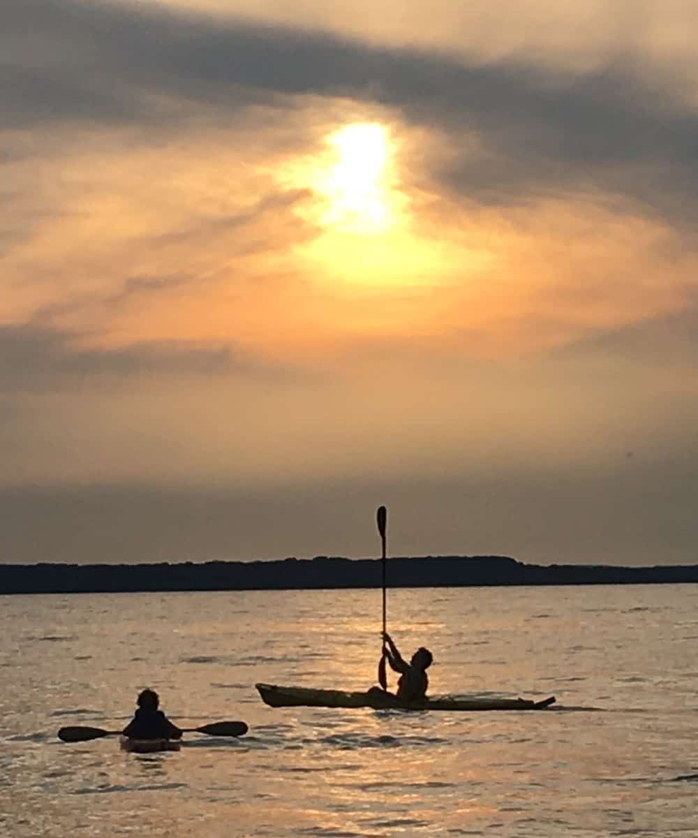 Kayaking at sunset on Lake Michigan