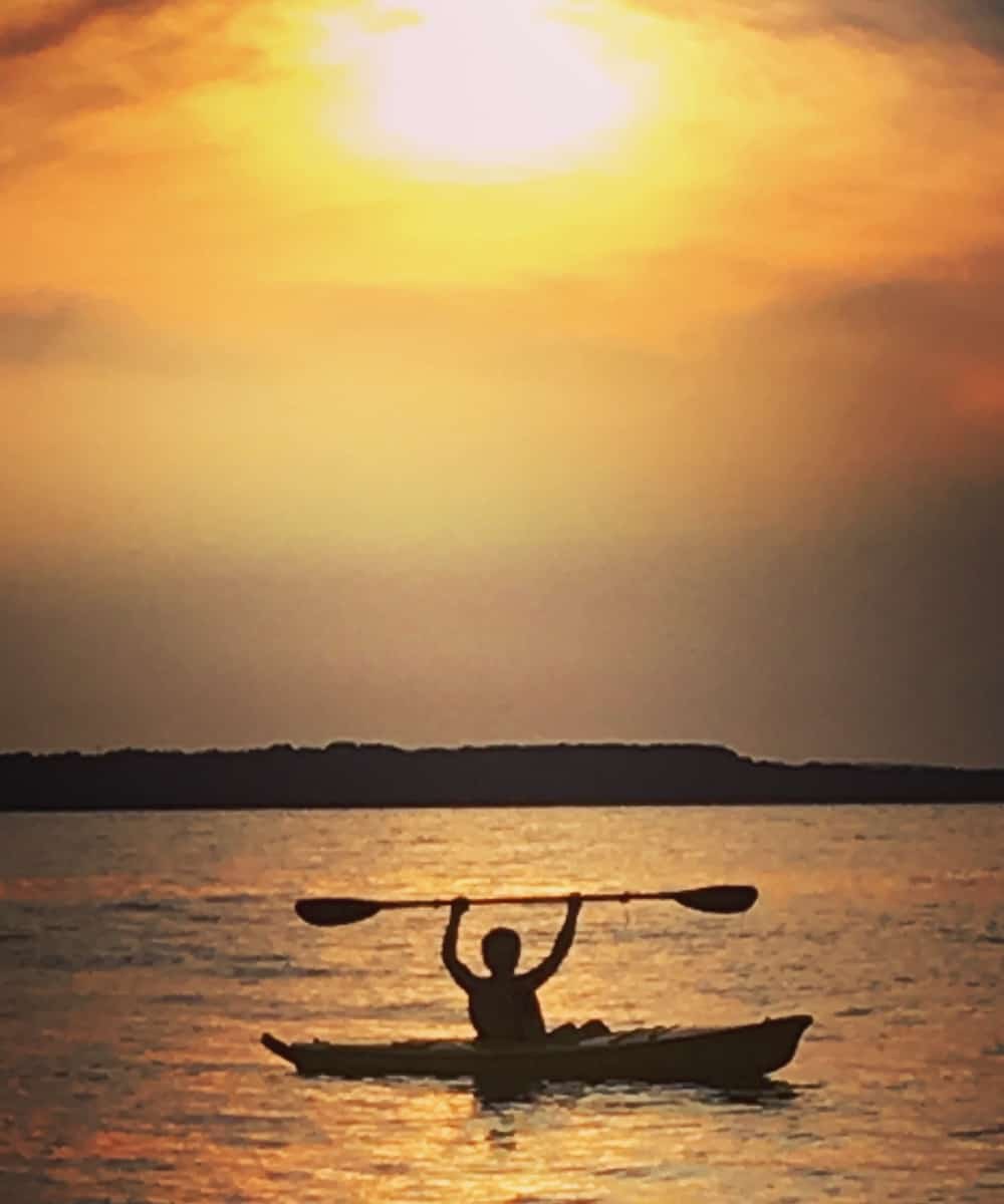Kayaking on Lake Michigan at sunset