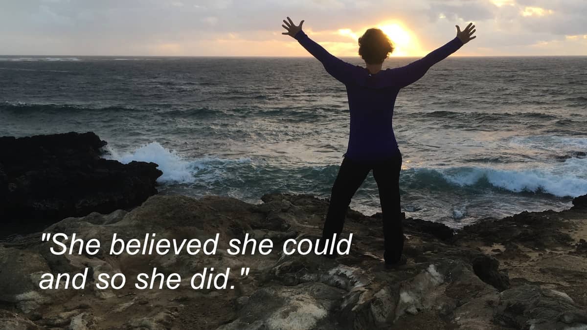 A photo of Amanda Rose in a Kauai sunset with the caption "She believed she could and so she did."