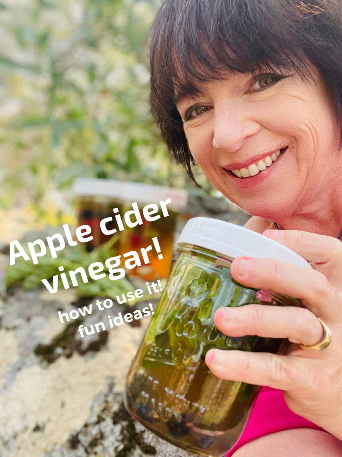 A photo of Amanda Rose holding a jar of infused apple cider vinegar with the title "Apple cider vinegar: How to Use it! Fun ideas!"