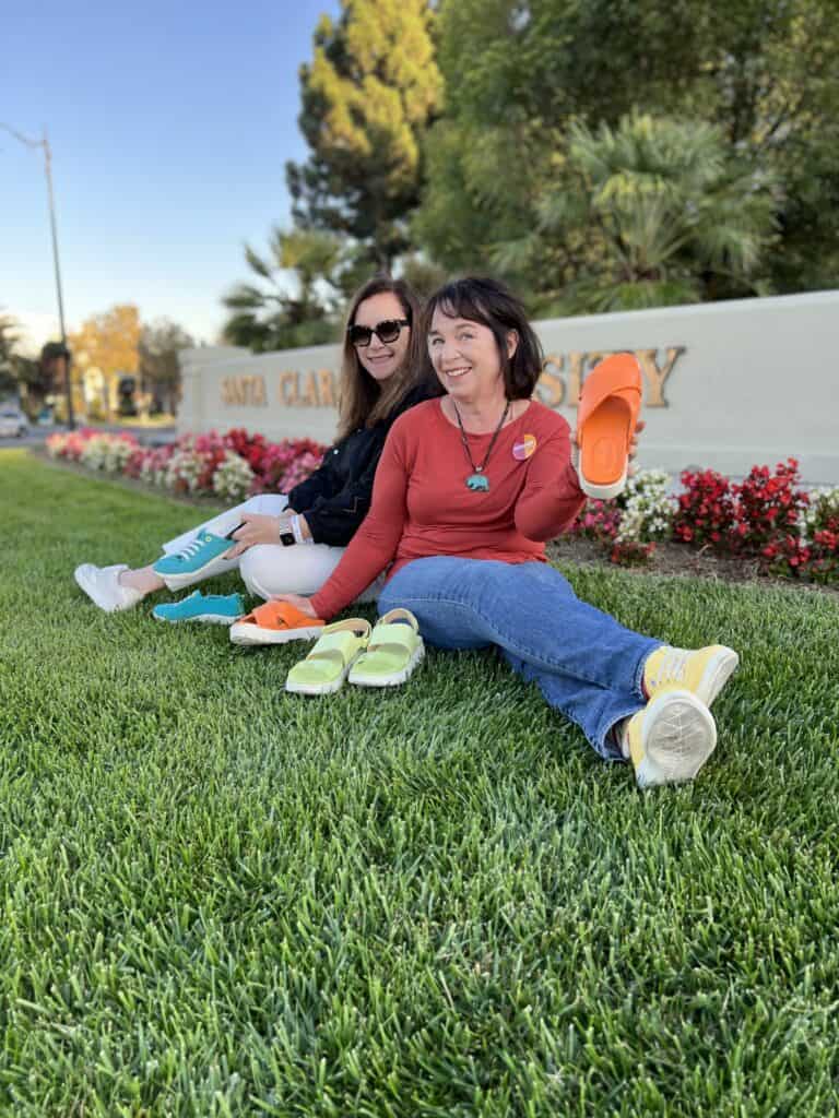 Amanda and Angela on the lawn at SCU with shoes!